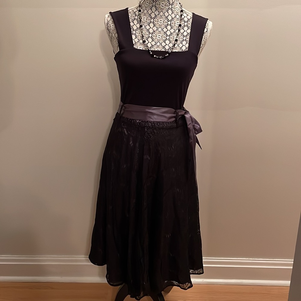 Dalia black lace overlay skirt with grey lining size 10.
